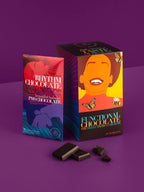 The Functional Chocolate Company’s Rhythm Chocolate - PMS Formula features a vibrant box with a woman’s face, butterflies, bold Functional Chocolate text, and promotes PMS relief with soothing SaffSerene on a striking purple background.