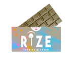 A partially unwrapped Rize 12G Mushroom Chocolate Bar with vibrant packaging labeled Rize Cookies and Cream, a psychedelic mushroom graphic, and MEGADOSE 12G at the top stands out against a white background.