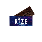 A partially unwrapped Rize 5G Mushroom Chocolate Bar in blue and purple packaging, labeled RIZE and featuring a white mushroom illustration—ideal for those seeking consistently dosed magic mushroom chocolate from the Rize brand.