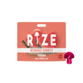 A red and pink pouch labeled Rize Megadose Gummies by Rize, featuring watermelon graphics and a mushroom-shaped gummy, offers premium-quality magic mushroom gummies for those seeking distinctive psychedelic edibles.