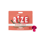 A red and pink pouch labeled Rize Megadose Gummies by Rize, featuring watermelon graphics and a mushroom-shaped gummy, offers premium-quality magic mushroom gummies for those seeking distinctive psychedelic edibles.