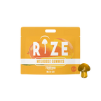 A yellow-orange Rize Megadose Gummies package (7500mg, Mango) with a mushroom icon and a single gummy beside it, ideal for those seeking premium psychedelic edibles from the Rize brand.