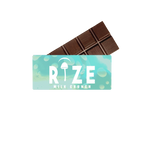 A partially unwrapped Rize 5G Mushroom Chocolate Bar reveals segment lines for consistent dosing, with a wrapper labeled Rize on a blue and white background.